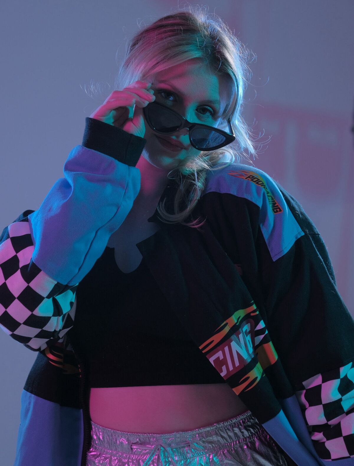 DJ Bayley under neon lights